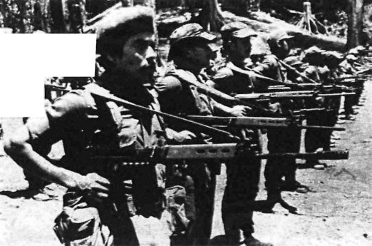 Contras holding rifles